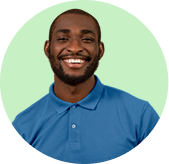 circle with a picture of a man with brown hair, wearing a blue shirt, smiling.